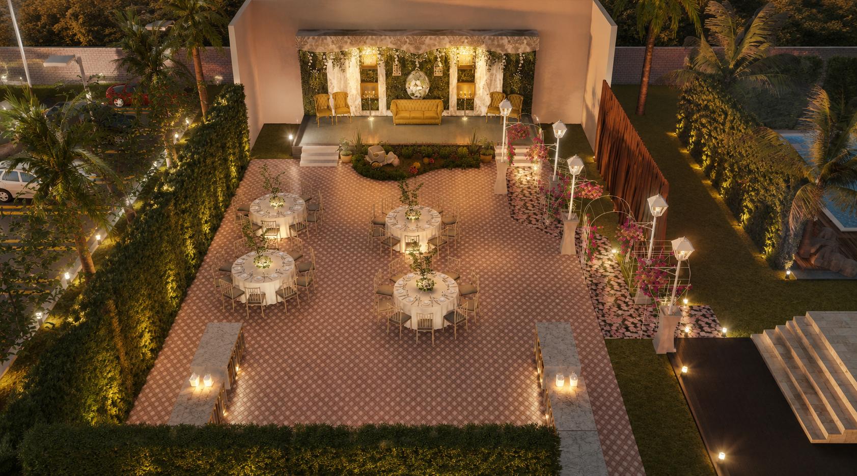 A decorated stage with drapes and floral backdrop, round tables set on the terrace below